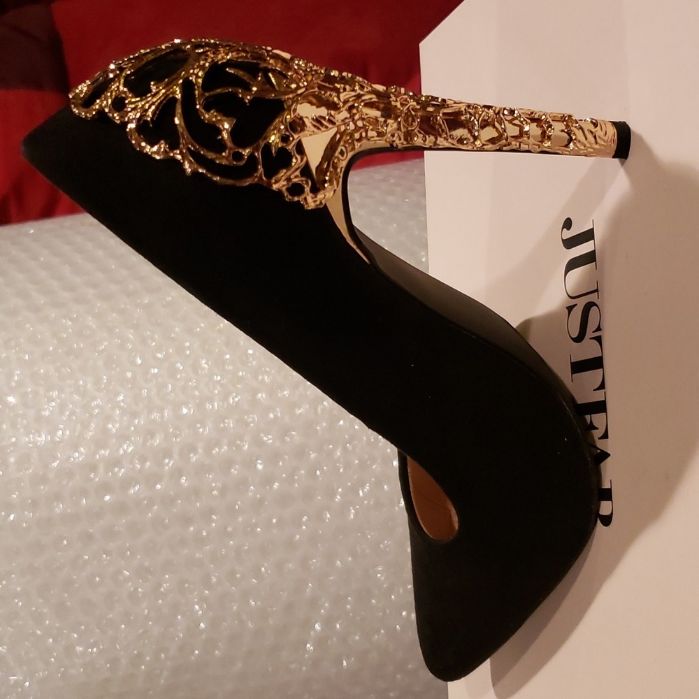 Black Suede pumps with decorative gold heel.